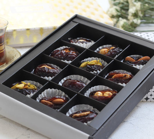 Qalmi date with Almond in its premium packaging.